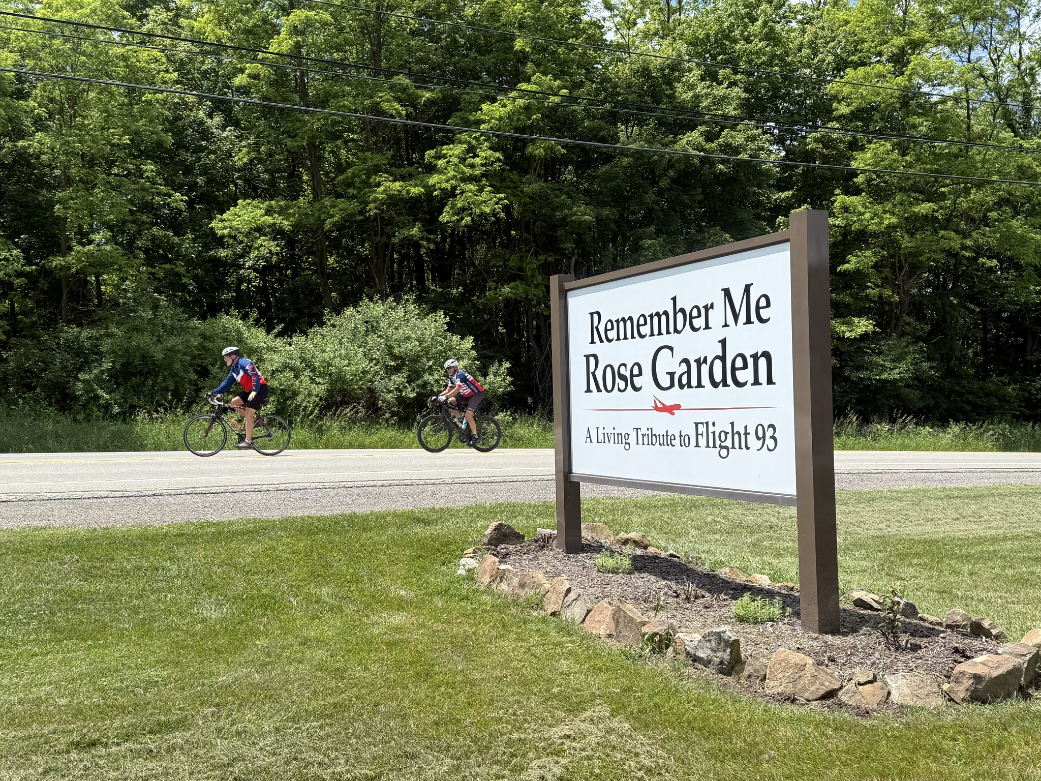 Cyclists Reach the Remember Me Rose Garden 