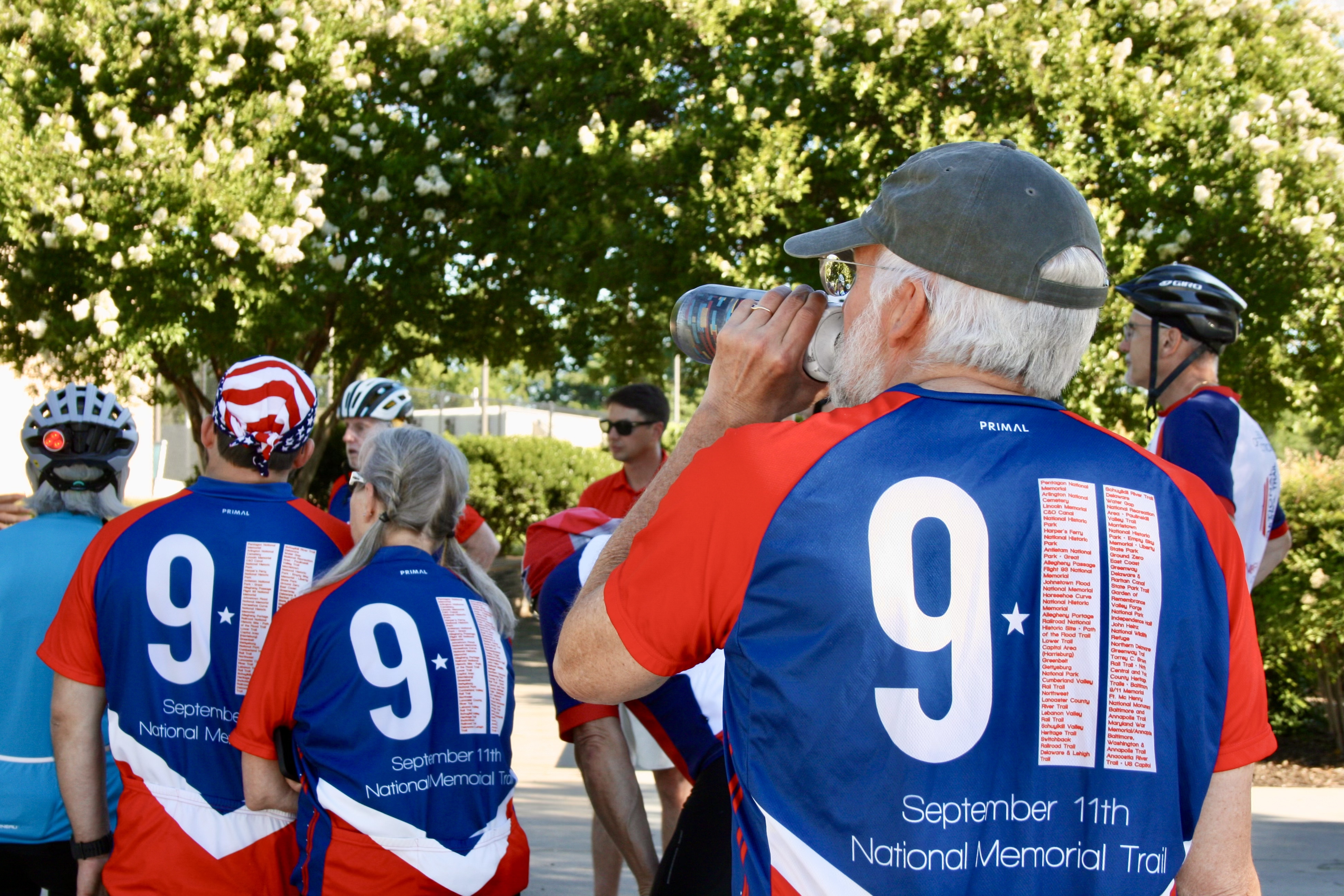 Cyclists gather at the Pentagon Memorial