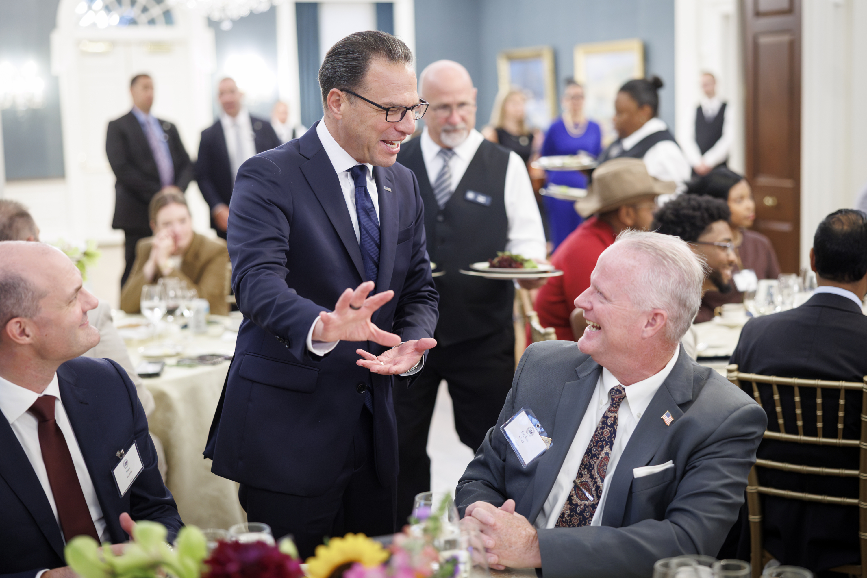 Governor Shapiro chatting with Board Chair Matt Harris, Superintendent Clark, and Secretary Cindy Adams Dunn 