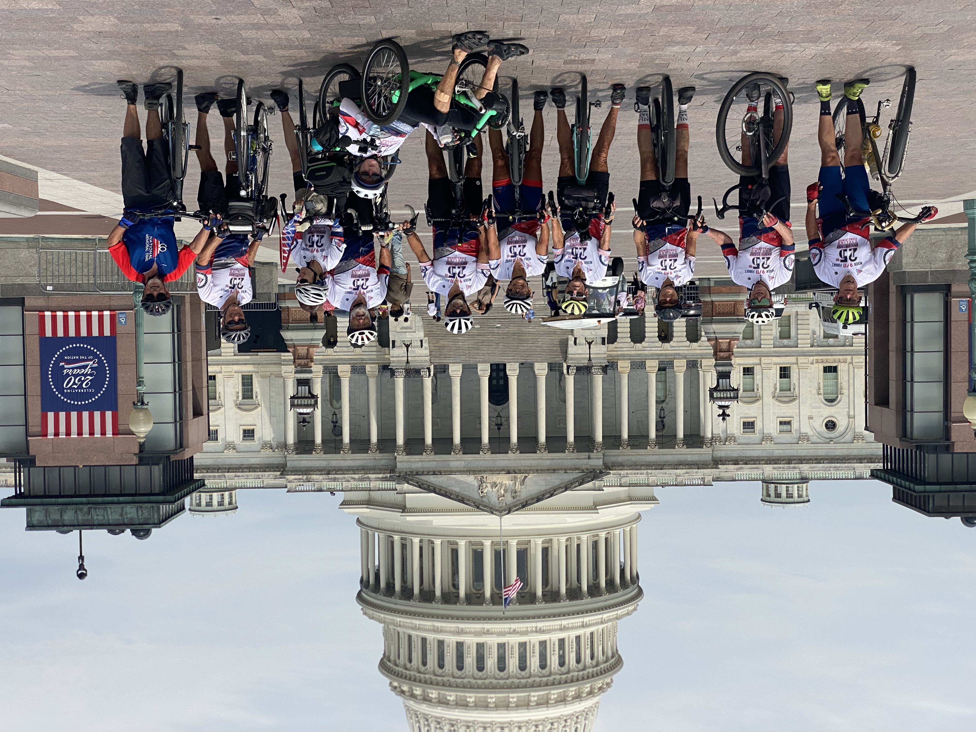 Cyclists pose for a group photo at the U.S. Capitol