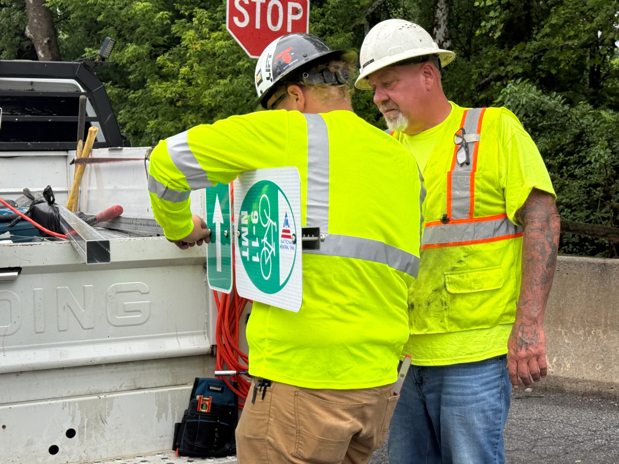 Unloading signage from the truck
